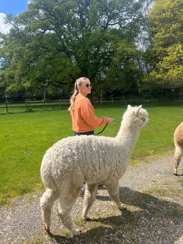 girl walking with pet